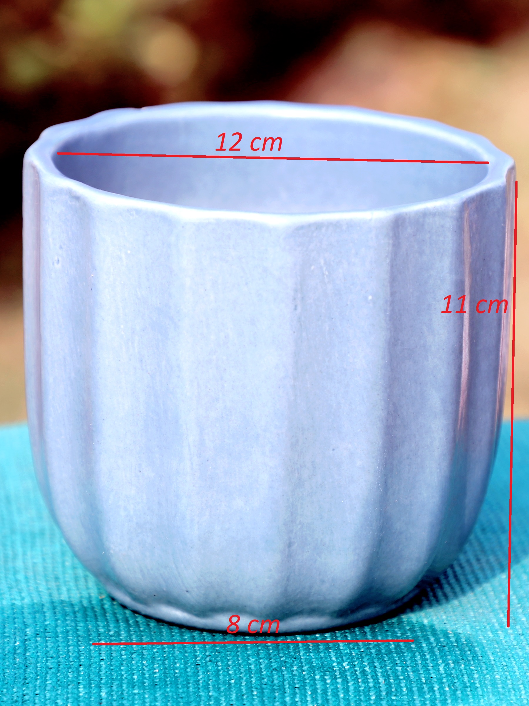 Modern ribbed textured blue ceramic planter with drainage hole by ThakurJi Organics